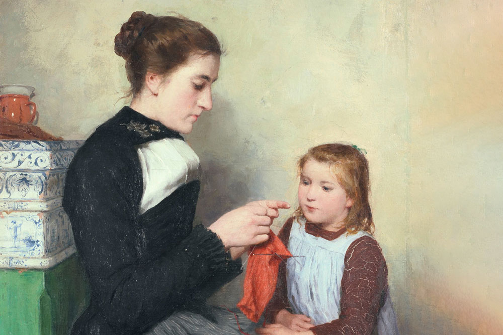 Mutter mit Kind beim Stricken